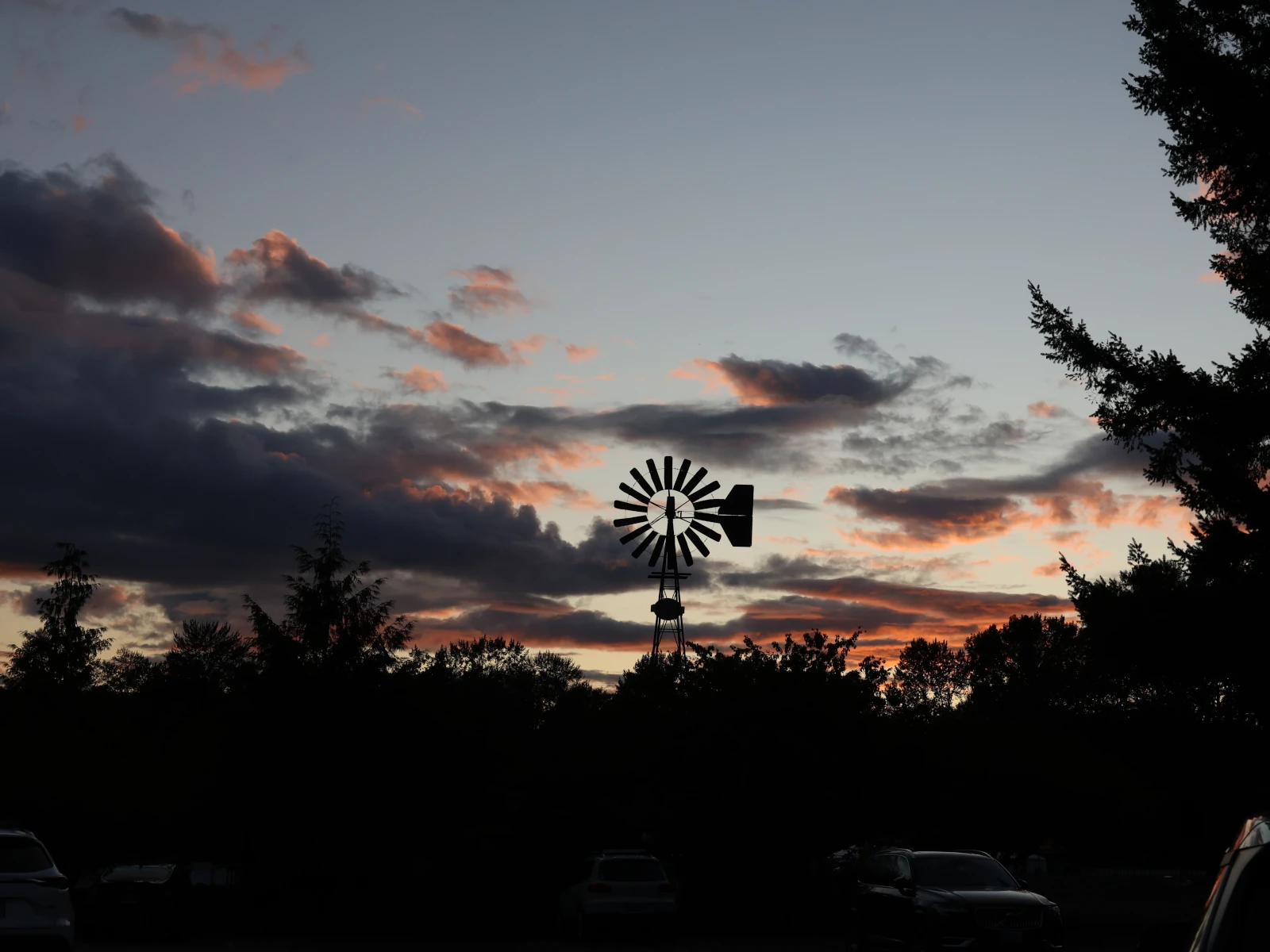 Windmill silhouetted against a fall sunset at Remlinger Farms in Carnation Washington